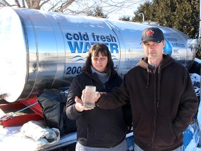 Paul and Jessica Brooks worry about where they will source their water in the future now that the Ministry of Environment and Climate Change has concluded the construction of the North Kent 1 Wind Farm project has not caused the water well to go bad on their home, north of Chatham. Ellwood Shreve/Postmedia Network