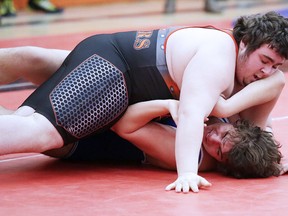 Drake Cryderman of Lasalle Secondary School pins Troy Gallant of Chelmsford Valley District Composite School during round robin action at the city high school wrestling championships in Sudbury, Ont. on Tuesday February 6, 2018. Gino Donato/Sudbury Star/Postmedia Network