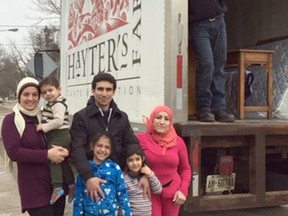 Zurich is welcoming the newest Syrian family to the area. The Omer family arrived in November and moved into their own apartment Jan. 27 after living with their relatives the El Muhammed family, also of Zurich. Pictured from left are mom Fadia, holding Muhammed, dad Muhsin with Erin and Helen, along with the children’s aunt, Mariya. Standing in the truck is Brad Tait. (Handout/Exeter Lakeshore Times-Advance)