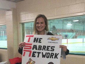 TSN’s Sportscentre anchor Jennifer Hedger is from Lambeth and has participated in Good Deeds Cup activities for two years. Above Hedger stands with a poster the Pee Wee C Sabres made for the game. The sign reads TSN: The Sabres Network instead of the usual The Sports Network. Hedger posted the picture to her Instagram profile after the game on Jan. 25. (Handout/Exeter Lakeshore Times-Advance)
