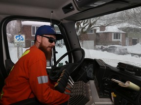 Jason Miller/The Intelligencer
City plow operator, Scott McCullough, navigates the streets of Belleville during Wednesday's snow storm.