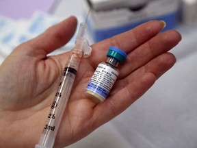 A bottle of the combined vaccine for measles, mumps and rubella.  File Photo/Postmedia Network