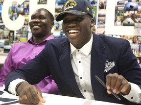 Daniel Johnson announced his commitment to attend Kent State University on a football scholarship Wednesday at Catholic Central high school. (MIKE HENSEN, The London Free Press)