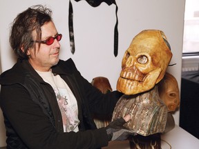 Richard Neufeld's personal collection of leather art masks by Bob Basset is featured as part of an exhibition at the Cambrian College Open Studio in Sudbury. John Lappa/Sudbury Star/Postmedia Network