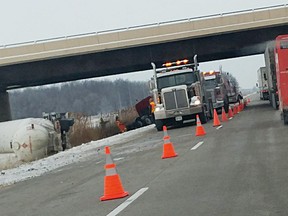 Responders attend a site crash under the Oil Heritage Road overpass Thursday morning, on Highway 402. (Submitted)