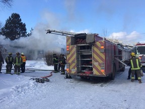 Greater Sudbury firefighters battle a stubborn blaze in Val Caron on Thursday afternoon. (Photo supplied)