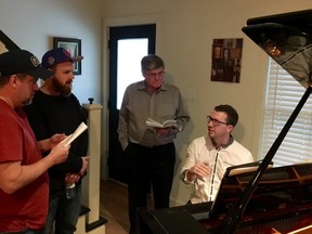 Evan Thompson, right, works with cast members Stephen Flindall, James Wybrow and Peter Leack on original music he composed for Aylmer Community Theatre’s production of A.R. Gurney’s The Dining Room, currently on stage at the Old Town Hall Theatre. Saturday’s 8 p.m. performance is to be ajudicated in Western Ontario Drama League Festival 2018 competition. (Contributed Photo // Times-Journal)