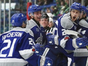 Anthony Tabak, right, of the Sudbury Wolves, celebrates his goal with teammates during OHL action against the Erie Otters at the Sudbury Community Arena in Sudbury, Ont. on Friday February 2, 2018. John Lappa/Sudbury Star/Postmedia Network