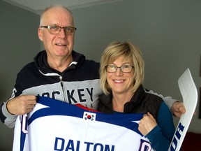 Larry and Karen Dalton, of Clinton, will be cheering on their son, Matt Dalton, who will tend goal for South Korea at the Pyeongchang Olympic Winter Games. Dalton, who plays for a Seoul team in the Asia League, was able to become a naturalized citizen so he?s eligible to play on South Korea?s Olympic squad. (MIKE HENSEN, The London Free Press)