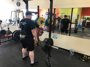 Jan Murphy performs a Romanian deadlift as part of his Friday training with Visionary Fitness owner Farr Ramsahoye at 247 Fitness in Kingston. (Farr Ramsahoye/Visionary Fitness)