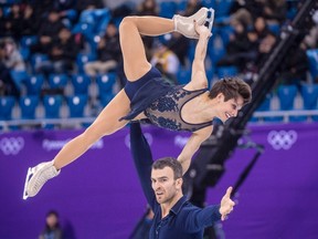 Canada's Meagan Duhamel and Eric Radford perform their short program in the pairs portion of the figure skating team competition at the Pyeonchang Winter Olympics Friday, February 9, 2018 in Gangneung, South Korea. (THE CANADIAN PRESS/Paul Chiasson)