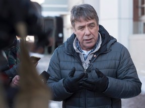 Former federal MP Peter Stoffer talks to reporters to address sexual harassment allegations in Halifax on Friday, Feb. 9, 2018. THE CANADIAN PRESS/Andrew Vaughan