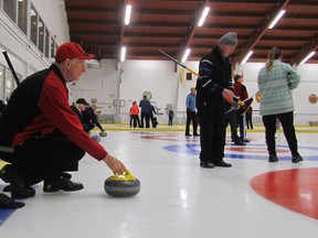 Paul Morden/Sarnia Observer/Postmedia Network
Les Shane, of Kincardine, prepared for a shot Saturday during action at the 45th annual Sarnia Oil Chemical Bonspiel, held at the Sarnia Golf and Curling Club.