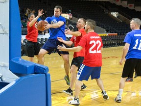 The London Police Services team came out ahead of their rivals from the London Fire Department at the sixth annual Battle of the Badges basketball game on Sunday, Feb. 11, 2018, with a final score of 25-21. (DEREK RUTTAN/The London Free Press)