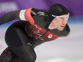 Canada’s Ted-Jan Bloeman skates to a silver medal in men’s 5,000 metres at the 2018 Winter Olympics. (Leah Hennel / Postmedia Network)