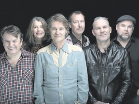 Jim Cuddy, third from left, and his bandmates Bazil Donovan, left, Anne Lindsay, Joel Anderson, Colin Cripps and Steve O?Connor are touring Canada with Cuddy?s emotional new solo album.?(Warner Music Canada)