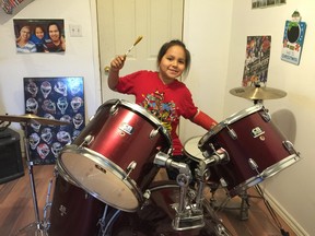 Pahquis Trudeau, 8, from Wikwemikong, shares his love of drumming for a TVO program about Indigenous youth. (Photo supplied)