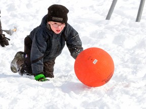 Cameron Schoonderwoerd gave an all-out effort pushing the ball towards the finish line during an obstacle course as part of the St. Patrick’s School in Kinkora’s Winter Carnival held at the school last Thursday, Feb. 8. ANDY BADER/MITCHELL ADVOCATE