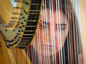 Intelligencer file photo
Tabitha Savic of Belleville plays the harp during Bay of Quinte Art and Wine Festival last year. Savic is one of many performers scheduled for the Quinte Cocktail Concert taking place later this month.