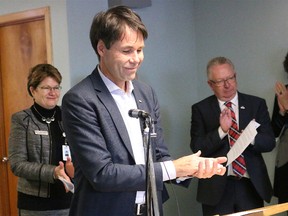 BRUCE BELL/THE INTELLIGENCER
Ontario Minister of Health and Long-Term Care Eric Hoskins was in Picton Monday afternoon to announce a $500,000 grant from the province to help Quinte Health Care plan for a rebuild of Prince Edward County Memorial Hospital. He is joined by (from left) QHC CAO Mary Clare Egberts, Mayor Robert Quaiff and PECMH Foundation board chairperson Monica Alyea.