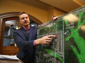 Jason Miller/The Intelligencer
Belleville resident, Matthew Maguire used maps to illustrate why he and dozens of other residents in the city's east end are opposing the proposed expansion of Haig Road. Council postponed moving ahead with the project until staff can provide potential alternatives to the current route of the road.