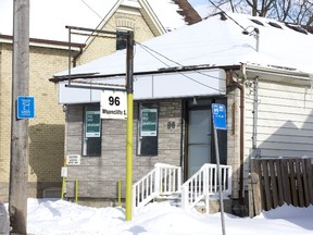 The former Tasty Budd's marijuana dispensary at 96 Wharncliffe Avenue. (DEREK RUTTAN, The London Free Press)