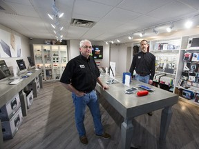 Mac Outpost co-owners Peter Miazga, left, and John Hauffe are concerned that a massive Wharncliffe Road reconstruction project will have a negative impact on their business. (DEREK RUTTAN/THE LONDON FREE PRESS)