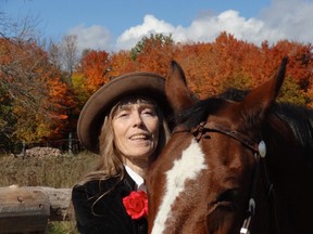 Supplied photo
Manitoulin’s multi-media artist Ann Beam with her delightful horse, Mystery. “She was a gift to me from Dr. Cathy Seabrook on 11/11/2011 at 11 o’clock in the morning, right here on my land. Every day Mystery shines brightly in my life.”