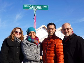 Connie Reid, executive director of The Children's Foundation, and Belleville Mayor Taso Christopher flank Reenu and Kuldeep Sandhu on the newly-named Sandhu Crescent Tuesday morning in Belleville. The route is just east of Avonlough Road and north of Dundas Street West. The Sandhus, who are Trenton residents, won the naming rights in the foundation's 2016 Guardian Angel Gala.