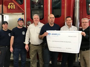 Union Gas made a $2,000 donation at the Dawn-Euphemia Firemen’s Breakfast on Feb. 4. The money will be used to purchase a defibrillator. From left are Greg Snow and Justin Van Daele, Union Gas employees and Dawn-Euphemia volunteer firemen; Chris Young, administration manager storage and transmission operations, Union Gas; Fire Chief David Williams; Jeff Gallie, manager system operations and compression at the Dawn plant for Union Gas; and Mayor Allan Broad.
Handout/Sarnia This Week