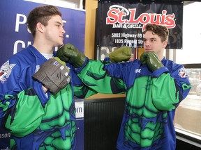 Darian and Drake Pilon of the Sudbury Wolves show off a superhero-themed jersey of the Hulk on Tuesday. The special jerseys will be worn by the team on Saturday when the Wolves host the Hamilton Bulldogs. Jerseys will be auctioned during the game with proceeds will be going to Camp Quality. Gino Donato/Sudbury Star/Postmedia Network