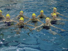 Members of Sudbury Synchro Swim Club's 11-12 year-old teams practise the egg beater pattern at the Jeno Tihanyi Olympic Gold Pool at Laurentian University on Tuesday. Gino Donato/The Sudbury Star