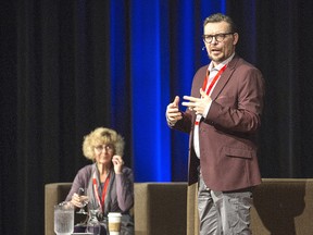 Former NHL star Theo Fleury will be coming to Chatham on April 26 to share his personal story of overcoming the obstacles in his life. He will be joined by therapist Kim Barthel, who co-authored his second book Conversations with a Rattlesnake: Raw and Honest Reflections on Healing and Trauma. They are pictured here during a presentation in Niagara Falls in 2017. File photo/Postmedia Network