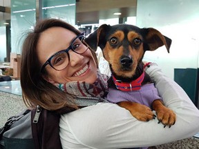 Canadian figure skater Meagan Duhamel with her dog Moo-tae in South Korea.