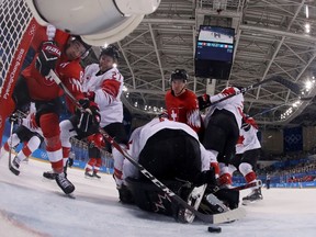 Czech Republic's Pavel Francouz (C) defends his goal in the men's preliminary round ice hockey match between South Korea and Czech Republic during the Pyeongchang 2018 Winter Olympic Games at the Gangneung Hockey Centre in Gangneung on February 15, 2018. (Getty Images)