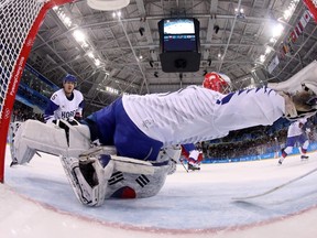 South Korea's Matt Dalton blocks a shot in the men's preliminary round ice hockey match between South Korea and Czech Republic during the Pyeongchang 2018 Winter Olympic Games at the Gangneung Hockey Centre in Gangneung. (Getty Images)