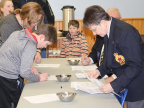 The Lucknow Legion held the annual Youth Public Speaking competition which included speakers from Lucknow Central Public School and Brookside Public School. Students in the Primary, Junior and Intermediate Levels delivered their best to a judging panel and a community that gathered at the Lucknow Legion on Friday Feb. 9, 2018. Winners were announced after much consideration and the 1st place winners will move on to the District level of the competition with hopes to make it to the Provincials. Pictured: Public Speaking competitors sign up and fill in the paper work for judges during the Lucknow Legion Public Speaking competition.