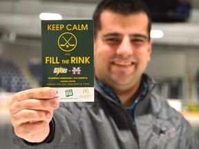 Andrew Buttigieg holds a ticket to Friday night's Fill the Rink hockey game between the St. Thomas Stars and the Chatham Maroons. This year they're unofficially trying to draw 2,000 people to the game with dignitaries like Mayor Heather Jackson and MP Karen Vecchio already confirmed for the event. (Louis Pin/Times-Journal)