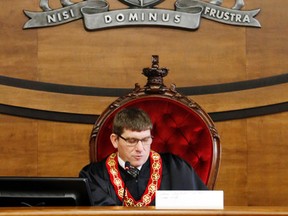 Luke Hendry/The Intelligencer
Hastings County Warden Rodney Cooney presides over a council meeting Thursday in Belleville. He's written the province's education minister to ask for a reconsideration of the province's funding of new child and family centres, which county staff estimate falls short by $500,000.