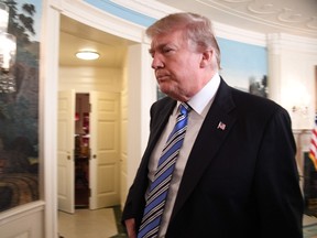 US President Donald Trump leaves after speaking on the Florida school shooting, in the Diplomatic Reception Room of the White House on February 15, 2018 in Washington, DC. JIM WATSON/AFP/Getty Images