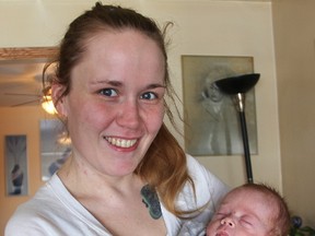 Pam Noble had a recent near-death experience in Sarnia hospital after showing up three times to the emergency department before being admitted. She’s pictured with her two-month-old son, Blaine (Tyler Kula/Sarnia Observer)