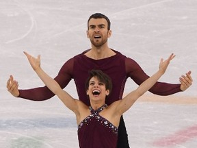 Canada's Meagan Duhamel and Canada's Eric Radford compete in the pair skating free skating of the figure skating event during the Pyeongchang 2018 Winter Olympic Games at the Gangneung Ice Arena in Gangneung on February 15, 2018. / AFP PHOTO / JUNG Yeon-JeJUNG YEON-JE/AFP/Getty Images