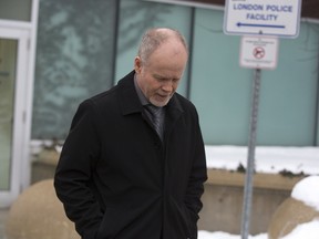 Sgt. Dale Howe leaves London police headquarters in London. The veteran police officer is under suspension. (Derek Ruttan/The London Free Press)