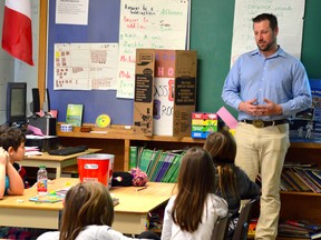 Beef farmer and Lambton Cattlemen’s Association vice-president Joe Dickenson spoke to Mooretown Public School students about agriculture on Friday. (Melissa Shilz/Postmedia Network)