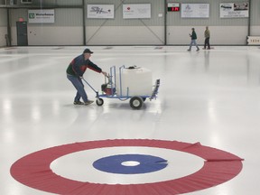 Ian MacAlpine/Whig-Standard file photo
Icemaker Rod Leeder prepares the ice at the then new Royal Kingston Curling Club on Days Road in October 2006.