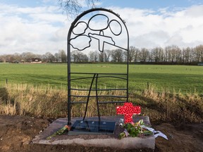 Photo by Arjan Vrieze/Courtesy Historiche kring Leusden 
A monument to the crew of an Allied bomber stands in a field after its unveiling Saturday, Feb. 3, 2018 in Leusden, Netherlands. At its base is a stone engraved with the names and ages of eight Allied crewmen, including Belleville's John "Jim" MacKenzie, who died when the plane crashed nearby on Feb. 3, 1943.