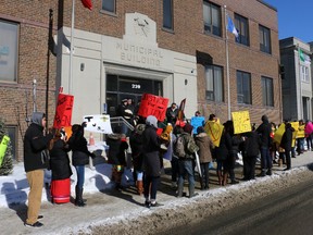 Dozens of protesters crowded onto the sidewalk and steps in front of Timmins city hall Friday Feb.16 as part of the anti-racism rally connected to the jury verdict in the Gerald Stanley / Colten Boushie case.  Stanley is the white farmer who was found not guilty of second–degree murder in the shooting death of Colten Boushie last week.   The rally featured several speakers including former Fist Nations chiefs Walter Naveau and Theresa Spence.  LEN GILLIS / Postmedia Network