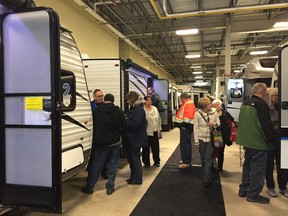 Crowds peruse the nearly 180 RVs and trailers on display at the London RV Show Saturday morning at the Metroland Media Agriplex.