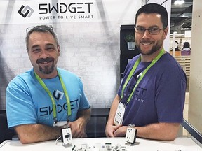 Lowell Misener and Chris Adamson of CALM Technologies Inc. in their Swidget booth at the CES Show in Las Vegas on Jan. 10. (Supplied photo)