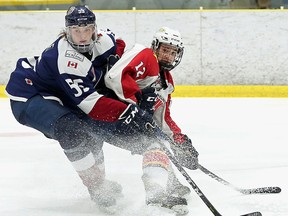 Belleville native Daniel Panetta of the Wellington Dukes battles for position with Pickering Panthers player Mitchell Doyle during OJHL action last weekend at Essroc Arena. (Ed McPherson/OJHL Images)